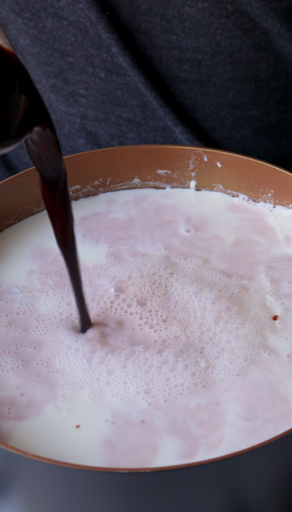 tea going into boiling milk